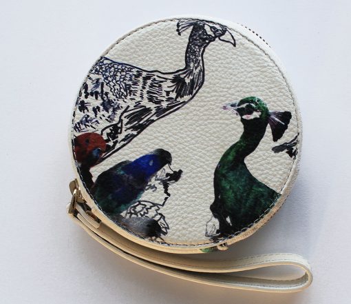 White leather purse with bird print for women.