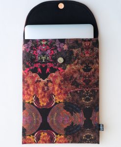 Floral laptop sleeve in black, purple and orange.